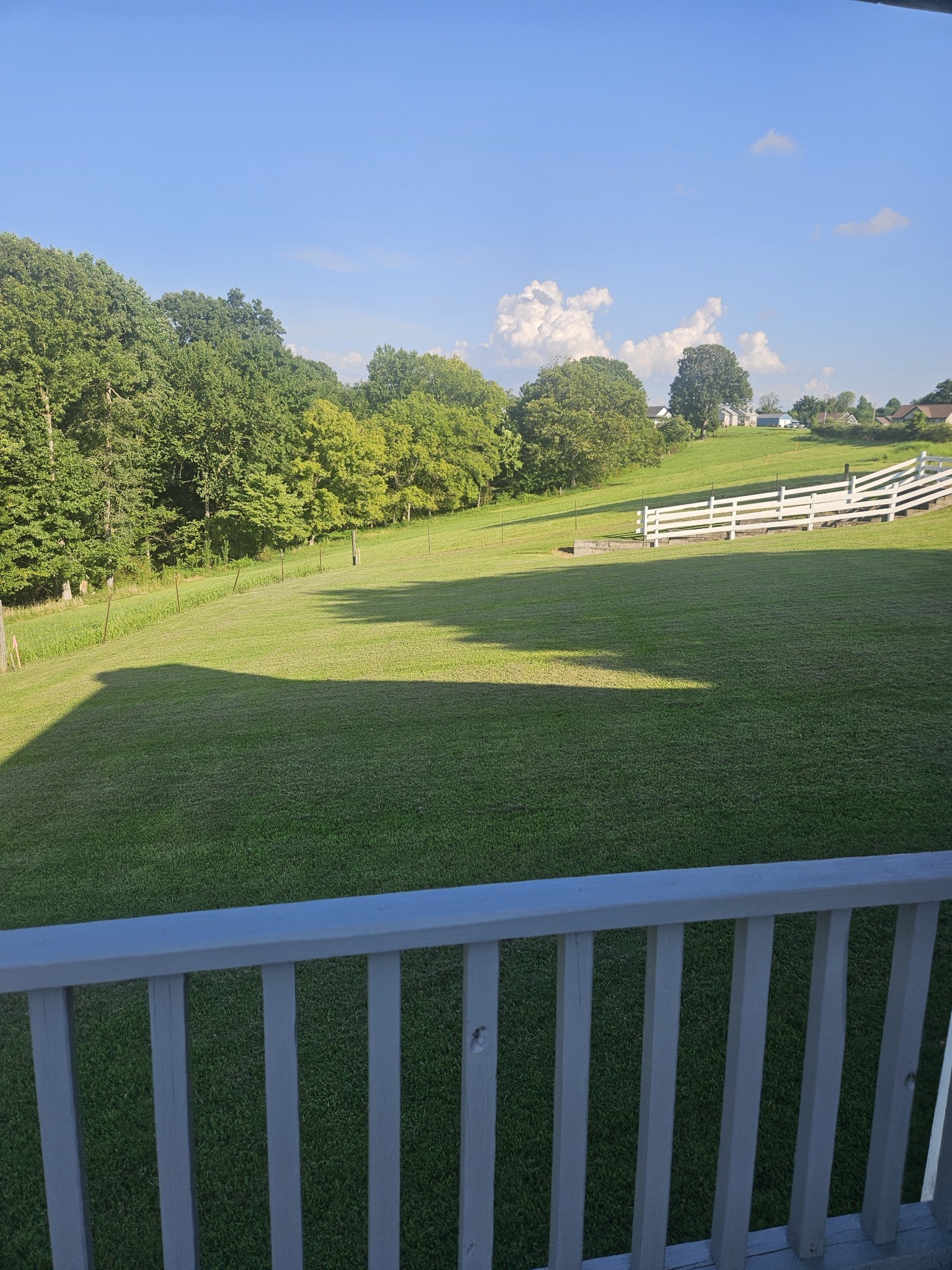 412 Hawkins Road Westmoreland, TN 37186 - Photo 7 of 20 a view of a green field with an ocean view