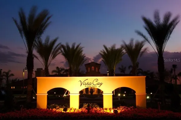 a bathroom with a sink vanity and a mirror