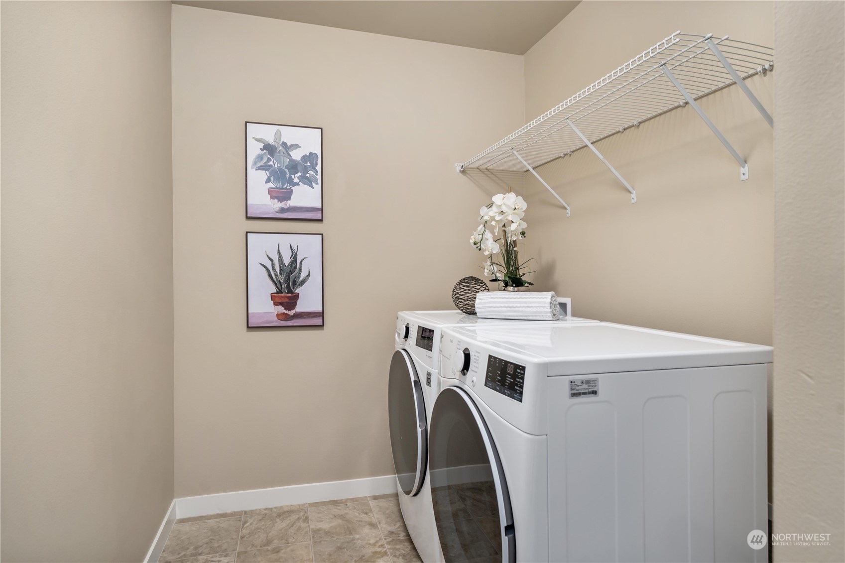 5514 Northeast 7th Place Renton, WA 98059 - Photo 27 of 36 a utility room with dryer and washer