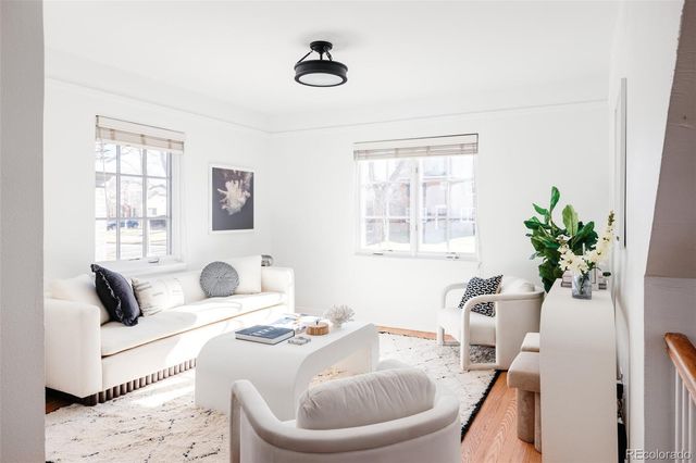 a living room with furniture and window