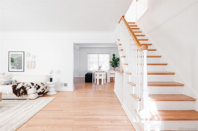 a view of a living room and entryway