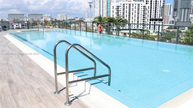 a view of swimming pool from a balcony
