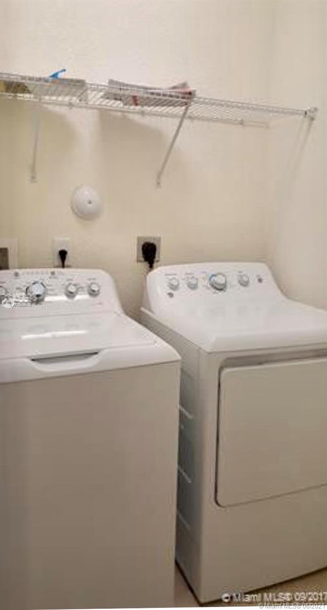 3771 Northeast 1st Street Homestead, FL 33033 - Photo 3 of 7 a utility room with dryer and washer