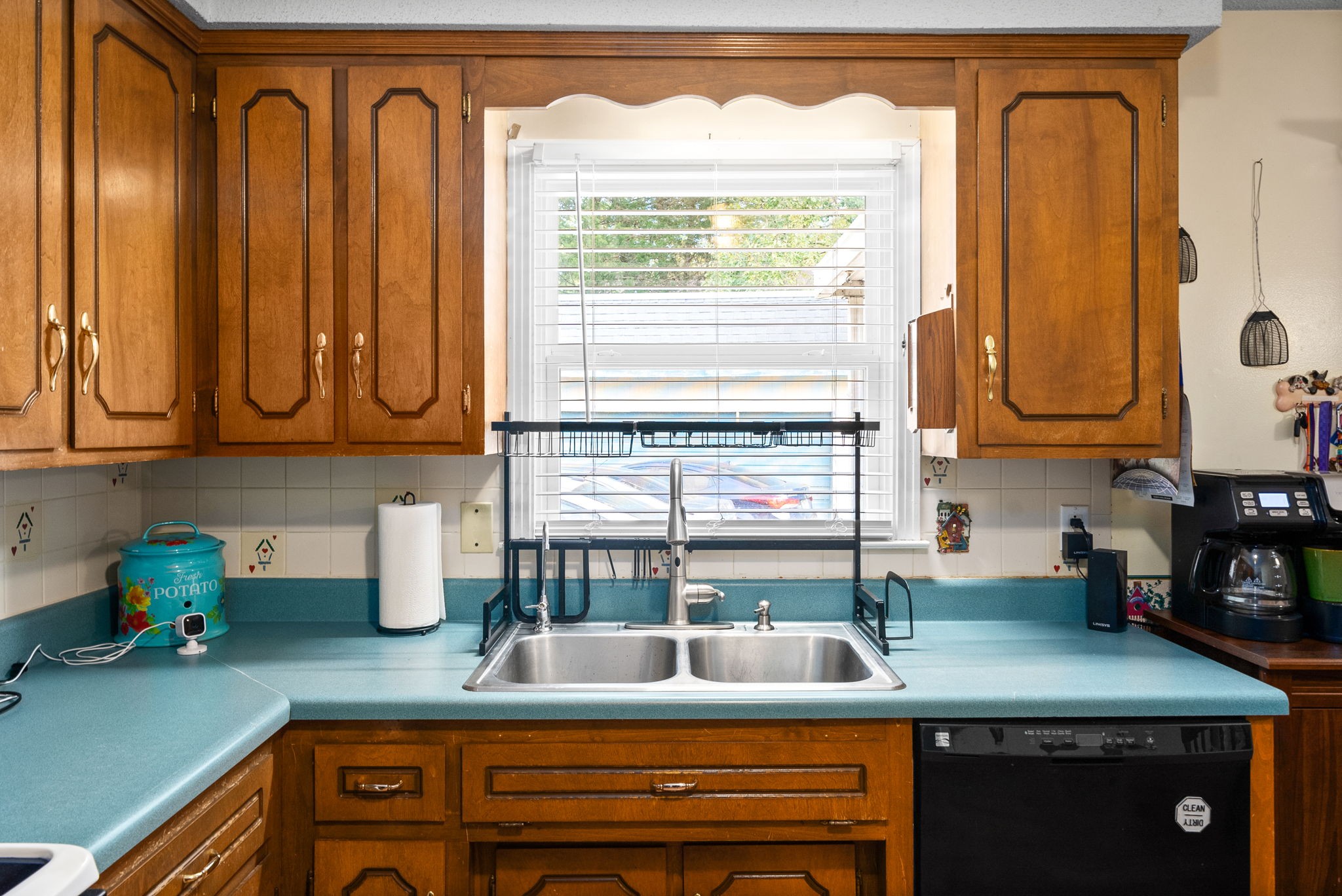 392 Dean Road Clarksville, TN 37040 - Photo 12 of 25 a kitchen with stainless steel appliances granite countertop a sink and a cabinets