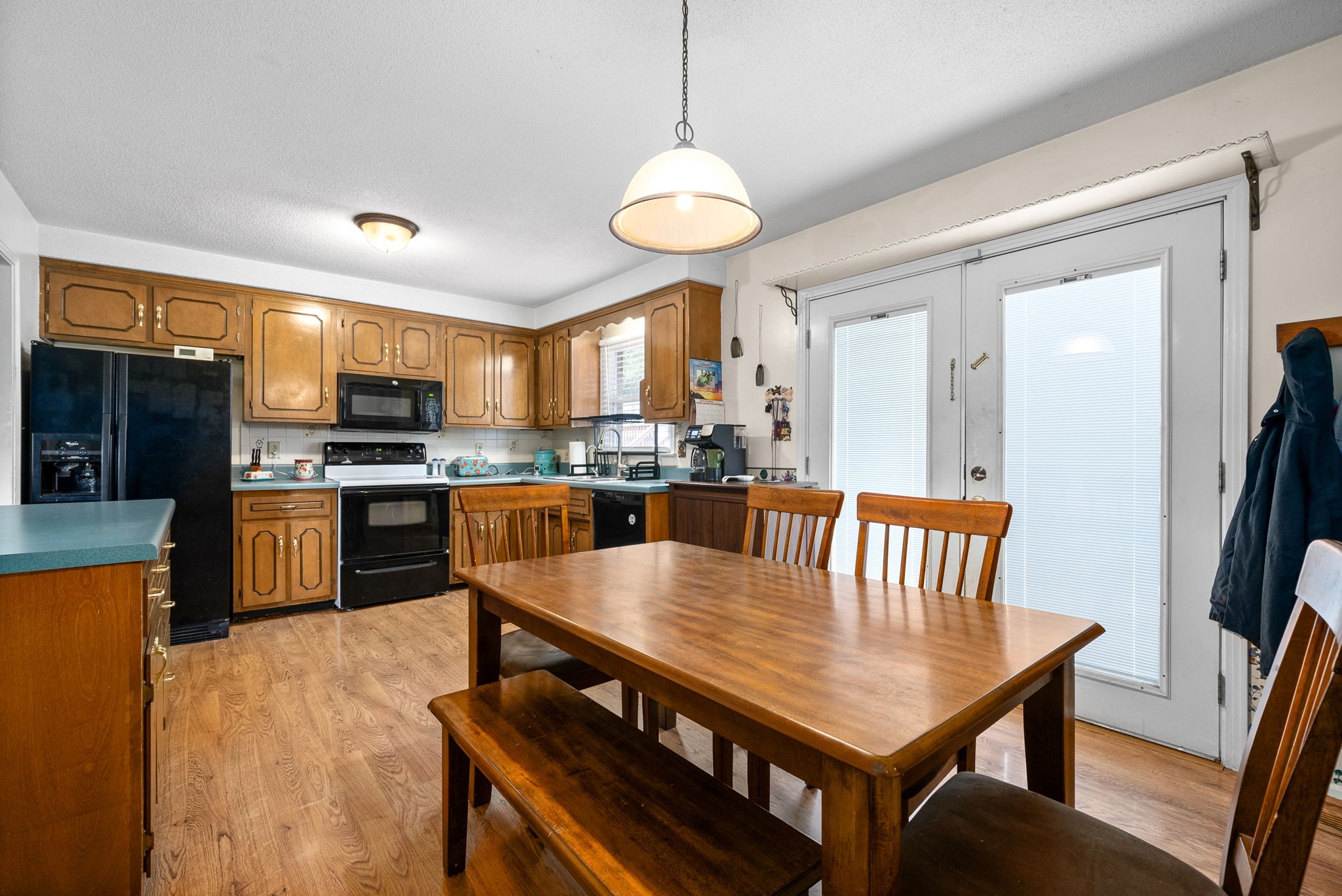 392 Dean Road Clarksville, TN 37040 - Photo 14 of 25 a large kitchen with a table and chairs