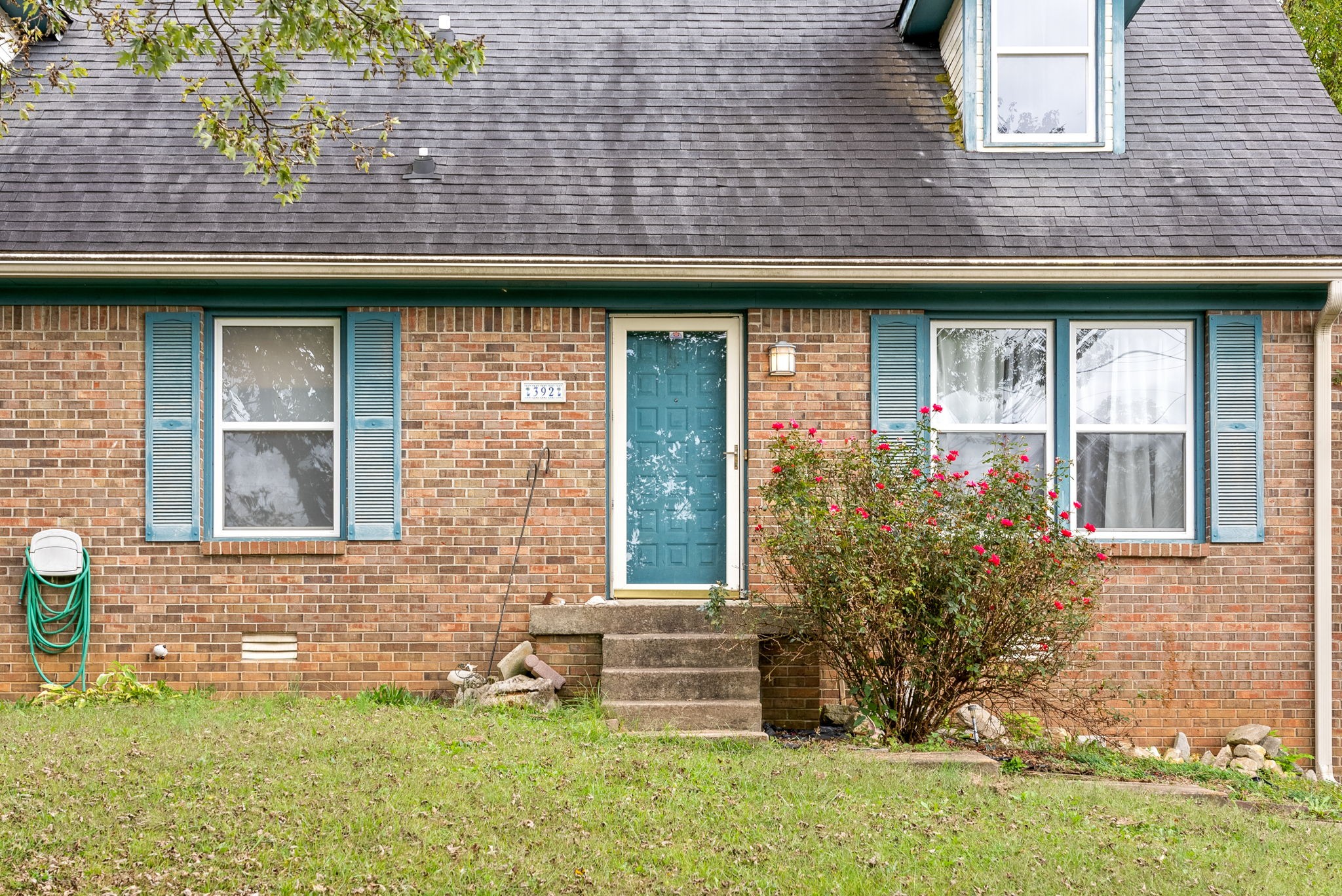 392 Dean Road Clarksville, TN 37040 - Photo 4 of 25 a front view of a house with a yard