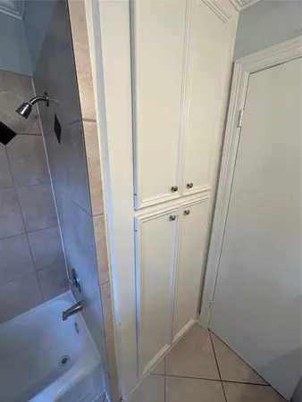 a bathroom with a sink and a shower