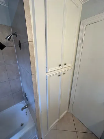 a bathroom with a sink and a shower