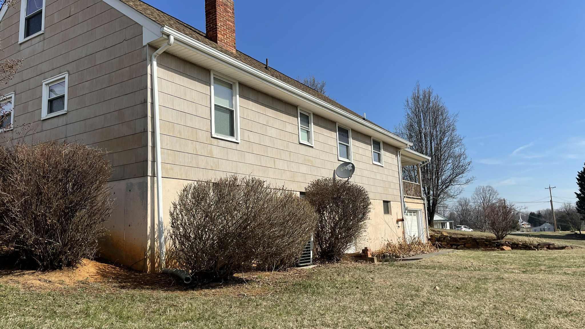 5980 Jordantown Road Vinton, VA 24179 - Photo 11 of 27 a view of a house with a yard
