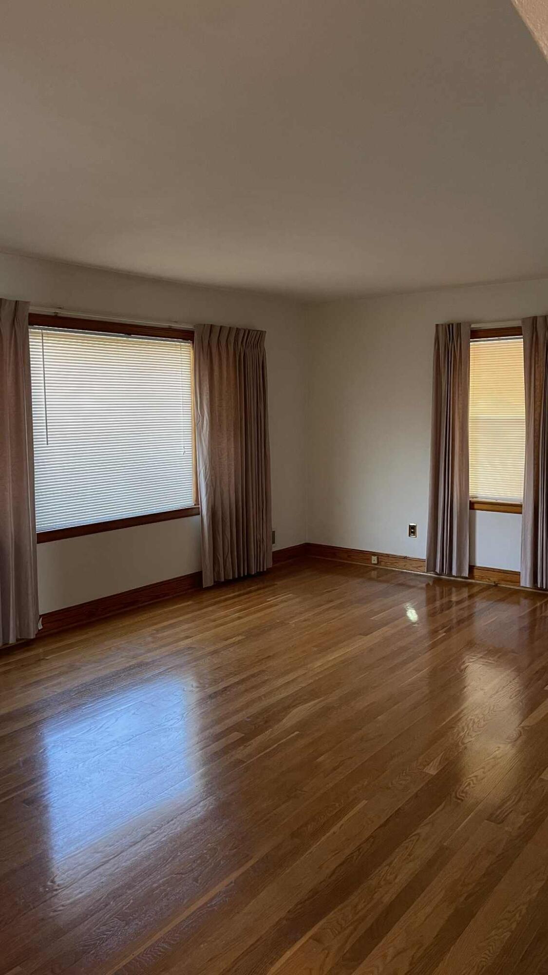 5980 Jordantown Road Vinton, VA 24179 - Photo 2 of 27 a view of empty room with wooden floor and fan