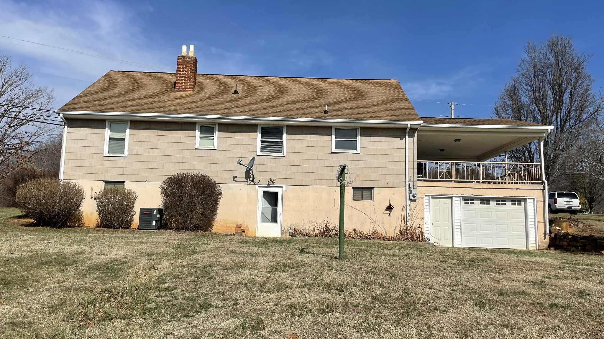 5980 Jordantown Road Vinton, VA 24179 - Photo 22 of 27 a front view of house with yard