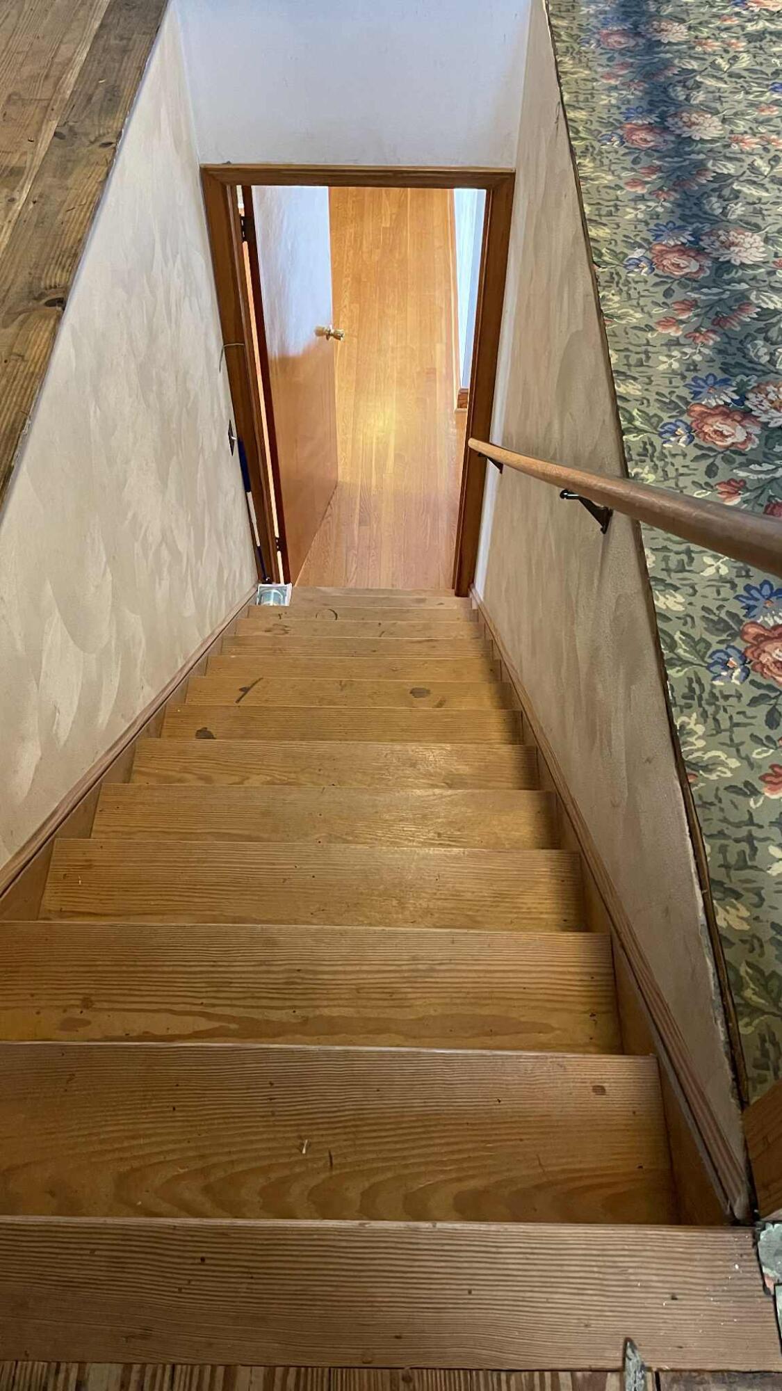 5980 Jordantown Road Vinton, VA 24179 - Photo 24 of 27 a view of a hallway with wooden floor and a floor to ceiling window