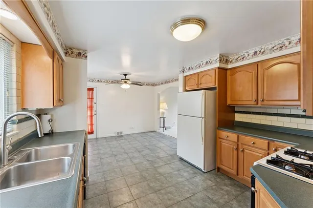 a bathroom with a sink and a washing machine