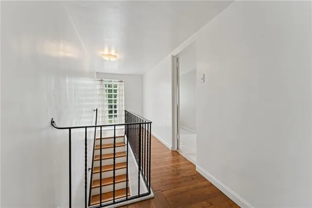 a view of entryway with wooden floor