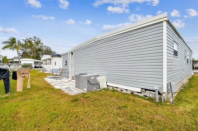 a view of a park with large trees