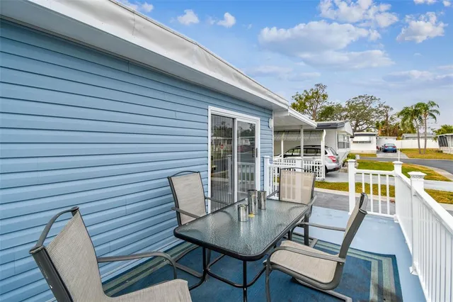 a view of a balcony with chairs