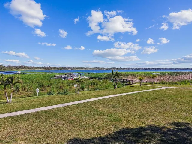 a living room with lots of furniture and a flat screen tv