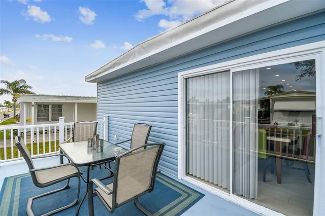 a kitchen with stainless steel appliances granite countertop a stove top oven microwave and cabinets