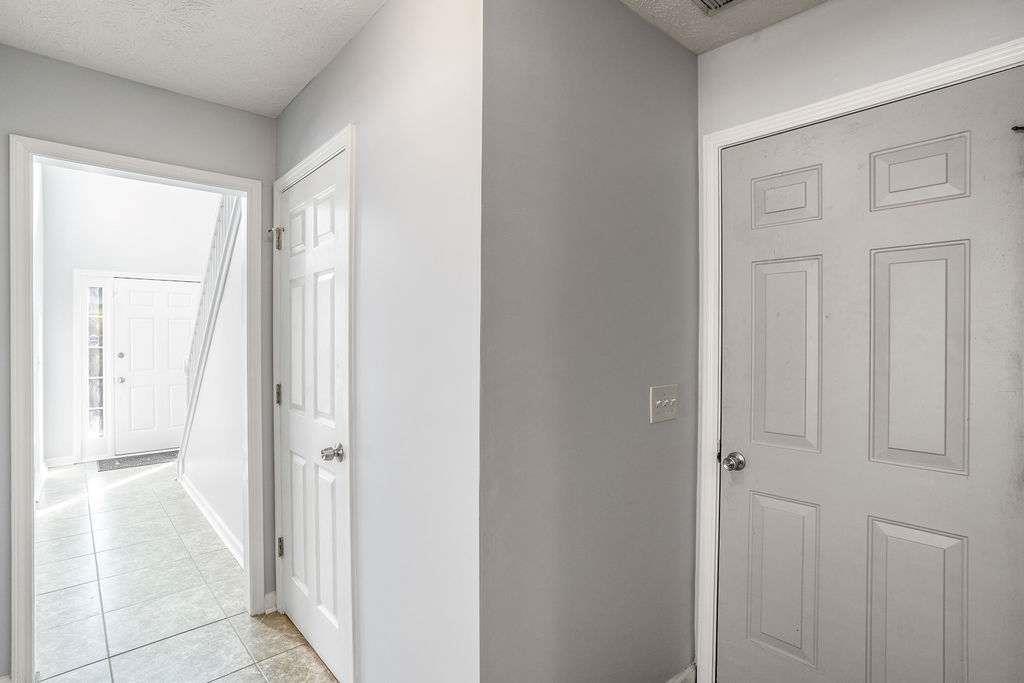 1461 Enchanted Forest Drive Conley, GA 30288 - Photo 20 of 47 a view of a bathroom from the hallway