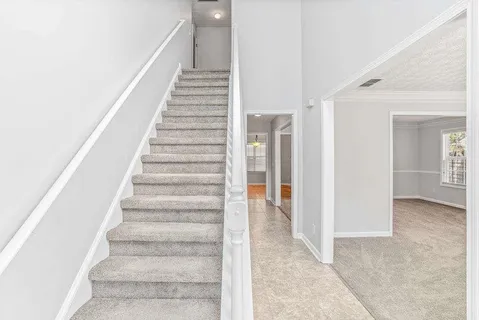 a view of an entryway with staircase