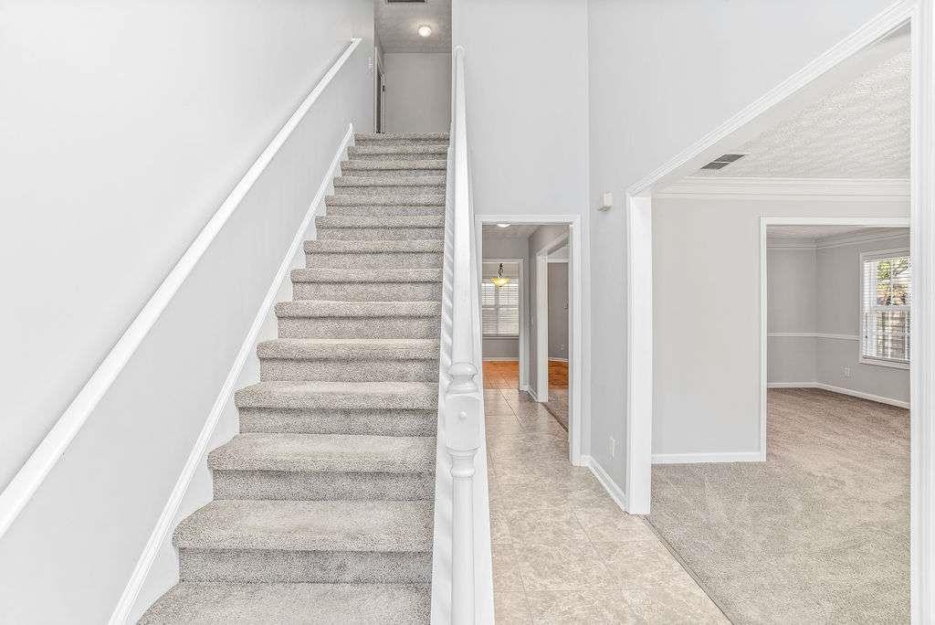 1461 Enchanted Forest Drive Conley, GA 30288 - Photo 3 of 47 a view of an entryway with staircase