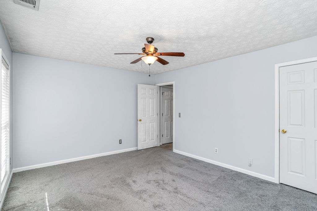 1461 Enchanted Forest Drive Conley, GA 30288 - Photo 37 of 47 wooden floor in an empty room