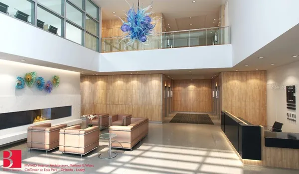 a lobby with furniture and rug