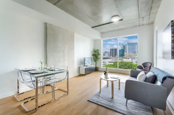 a living room with furniture and a table