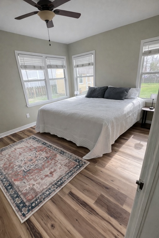 305 West Davilla Street Granger, TX 76530 - Photo 16 of 20 a bedroom with a bed window and dresser