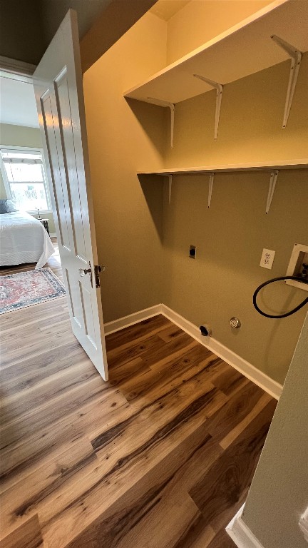 305 West Davilla Street Granger, TX 76530 - Photo 20 of 20 a bathroom with a sink and a mirror