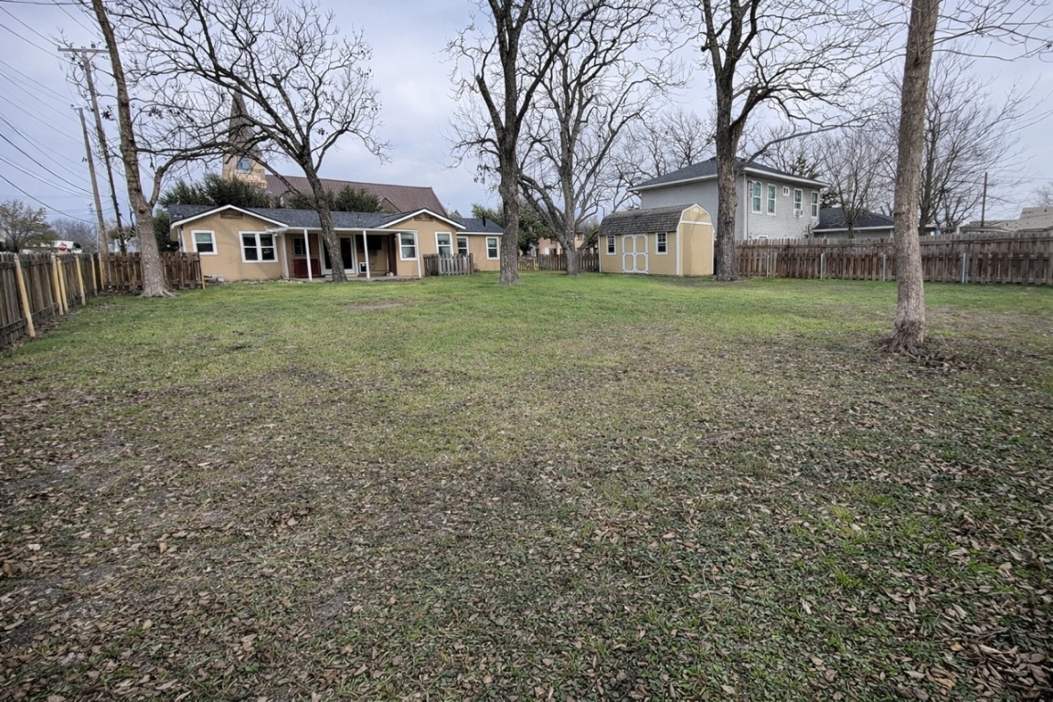 305 West Davilla Street Granger, TX 76530 - Photo 2 of 20 a view of house with yard
