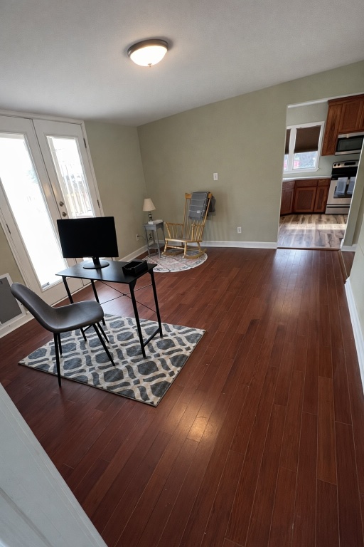 305 West Davilla Street Granger, TX 76530 - Photo 3 of 20 a living room with furniture and a flat screen tv