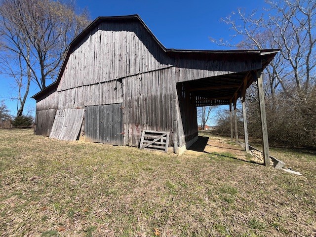 8 Pea Ridge Road Liberty, TN 37095 - Photo 19 of 27 a view of a house with a wooden fence