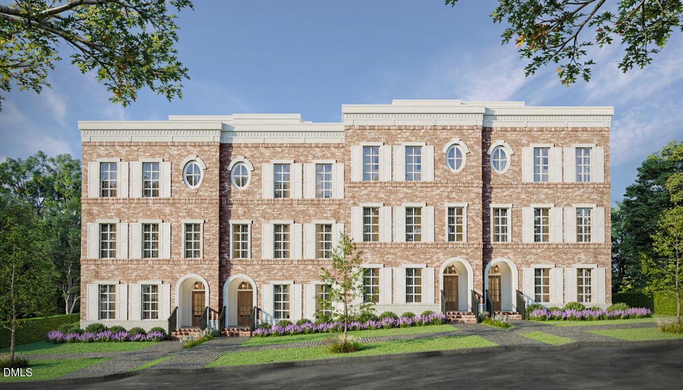 a view of a building with a yard