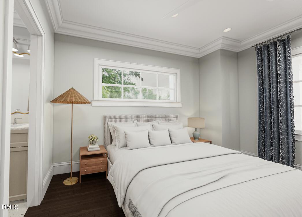 2312 Grant Avenue Raleigh, NC 27608 - Photo 15 of 18 a bedroom with a bed and a lamp