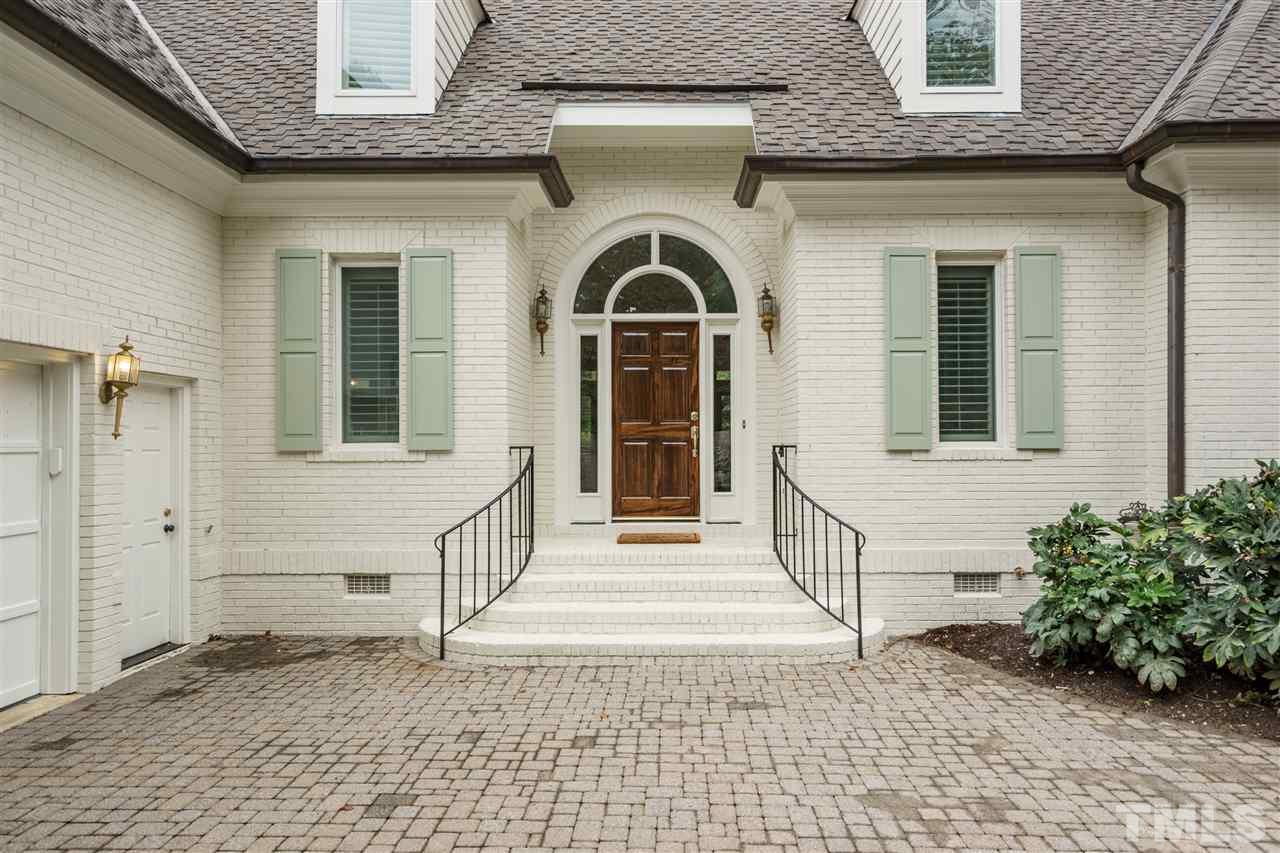a front view of a house with a porch