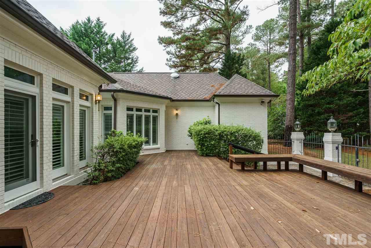 7628 Rainwater Road Raleigh, NC 27615 - Photo 24 of 25 a view of a house with backyard and sitting area