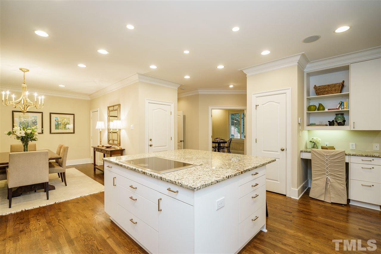 7628 Rainwater Road Raleigh, NC 27615 - Photo 8 of 25 a bathroom with a granite countertop sink and a mirror