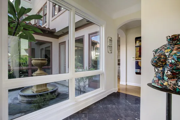a view of a hallway with front door