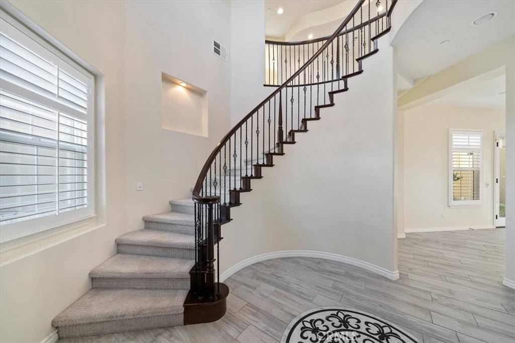 3094 Crystal Ridge Lane Colton, CA 92324 - Photo 14 of 68 a view of entryway and hall with wooden floor