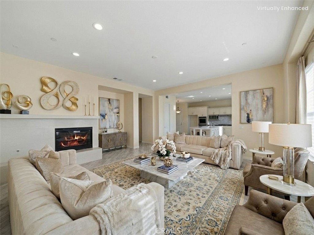 3094 Crystal Ridge Lane Colton, CA 92324 - Photo 25 of 68 a living room with furniture and a fireplace