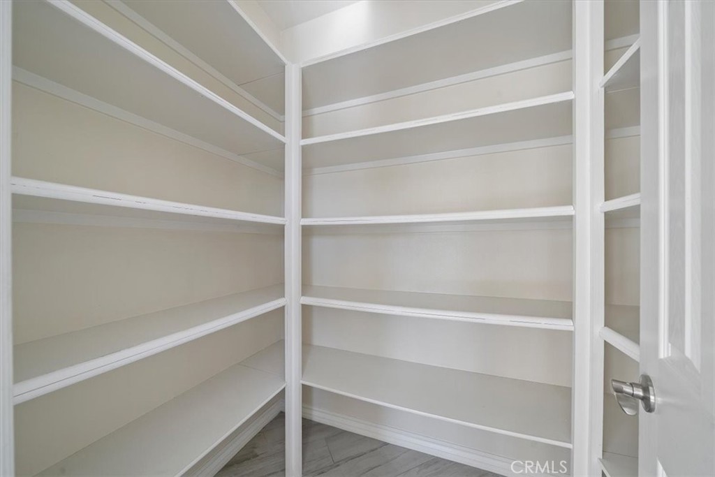 3094 Crystal Ridge Lane Colton, CA 92324 - Photo 34 of 68 a view of walk in closet with empty racks