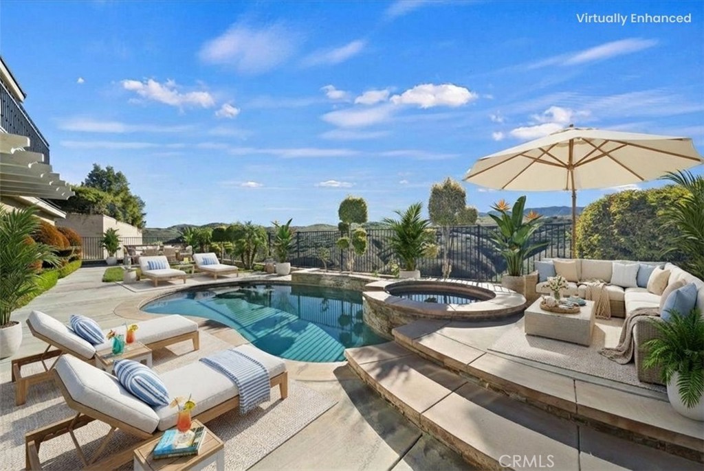 3094 Crystal Ridge Lane Colton, CA 92324 - Photo 58 of 68 a view of a swimming pool with lounge chairs