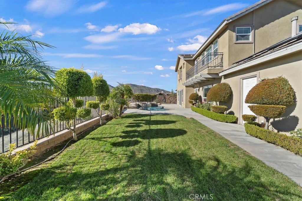 3094 Crystal Ridge Lane Colton, CA 92324 - Photo 63 of 68 a view of a house with a yard