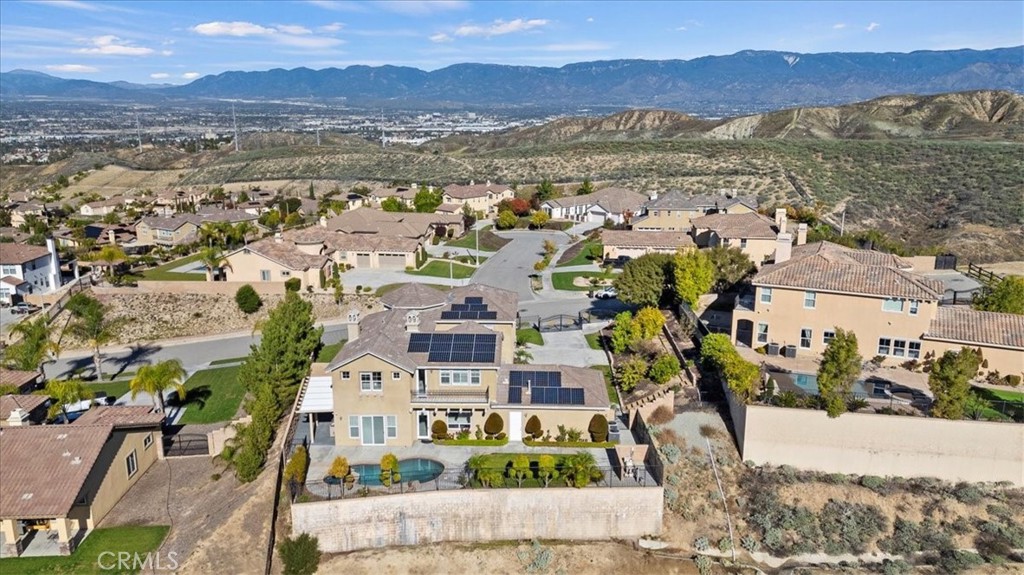 3094 Crystal Ridge Lane Colton, CA 92324 - Photo 67 of 68 an aerial view of residential houses with outdoor space