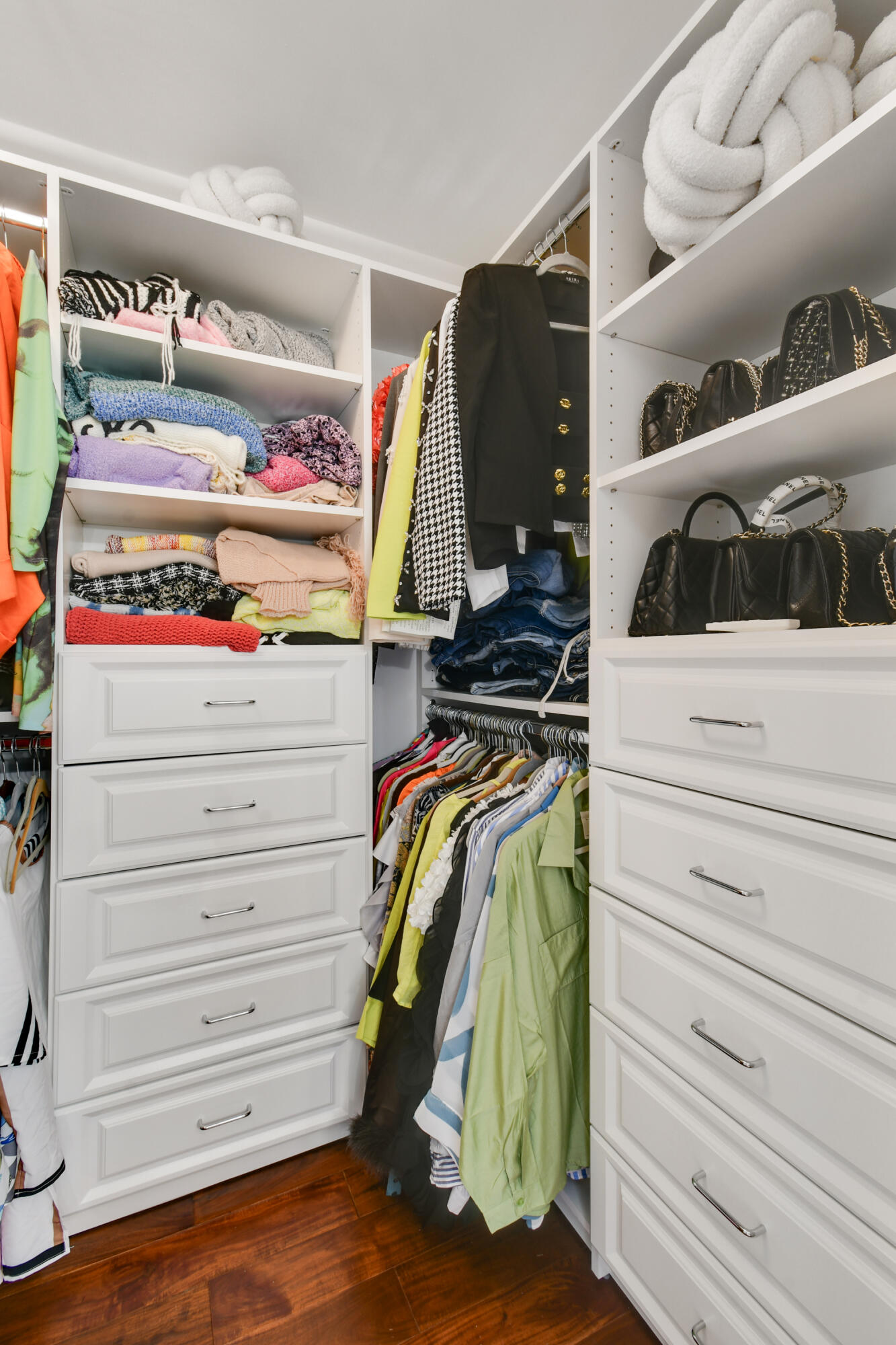 2401 Marina Isle Way, Unit 503 Jupiter, FL 33477 - Photo 24 of 46 a view of walk in closet with clothes and shoes