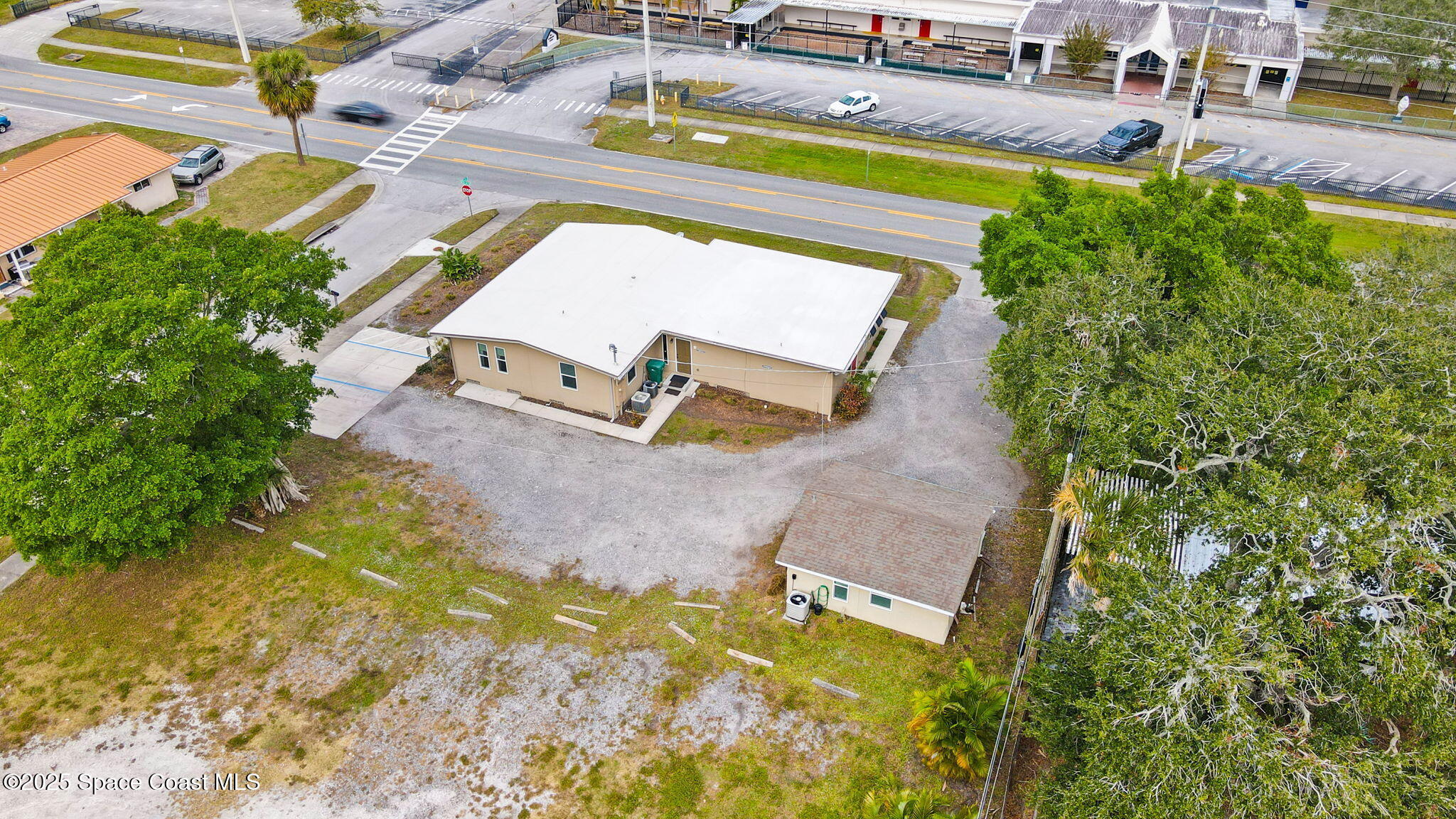 290 Parnell Street Merritt Island, FL 32953 - Photo 11 of 48 an aerial view of a house with swimming pool