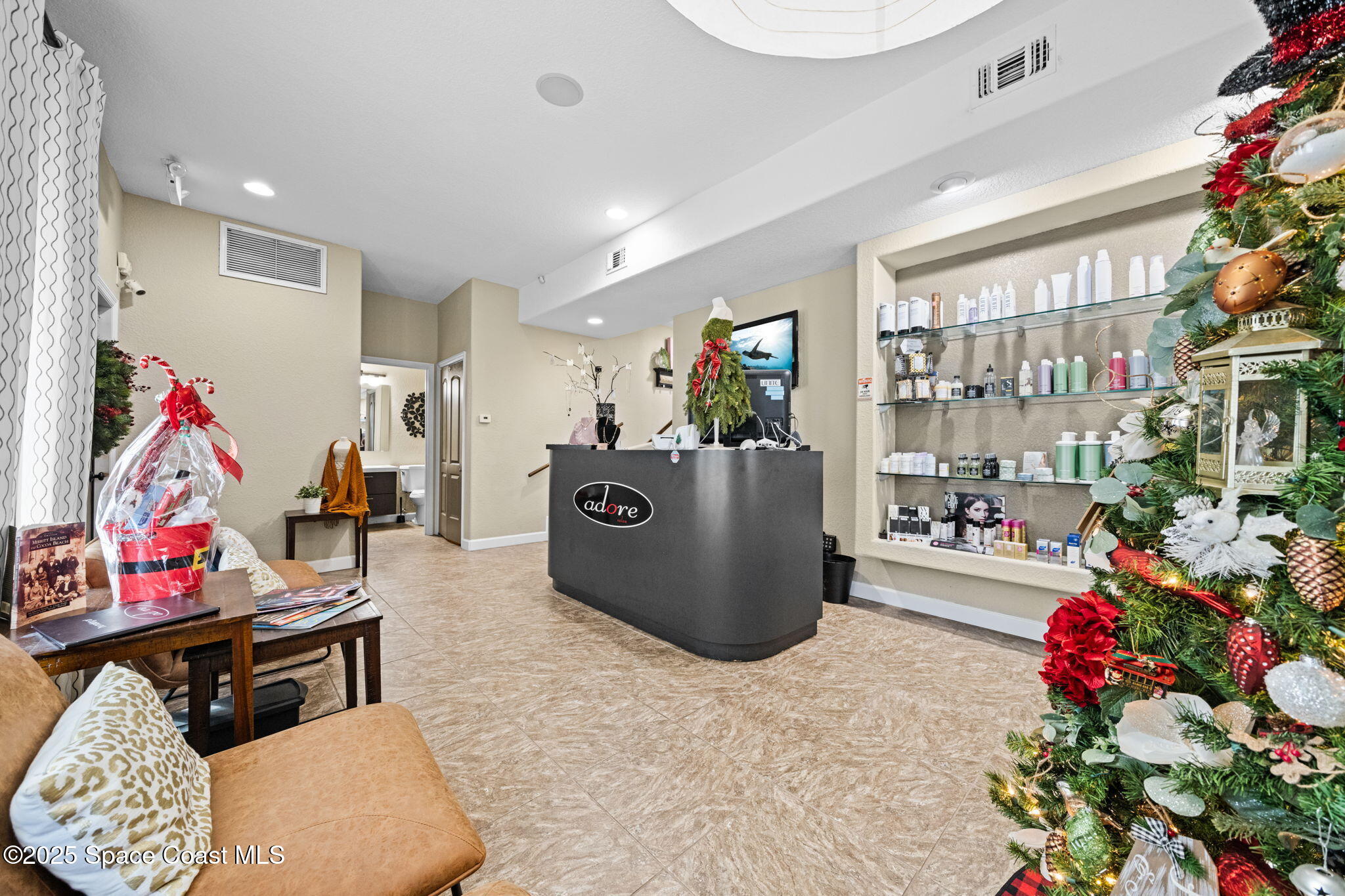 290 Parnell Street Merritt Island, FL 32953 - Photo 14 of 48 a living room with furniture and a potted plant