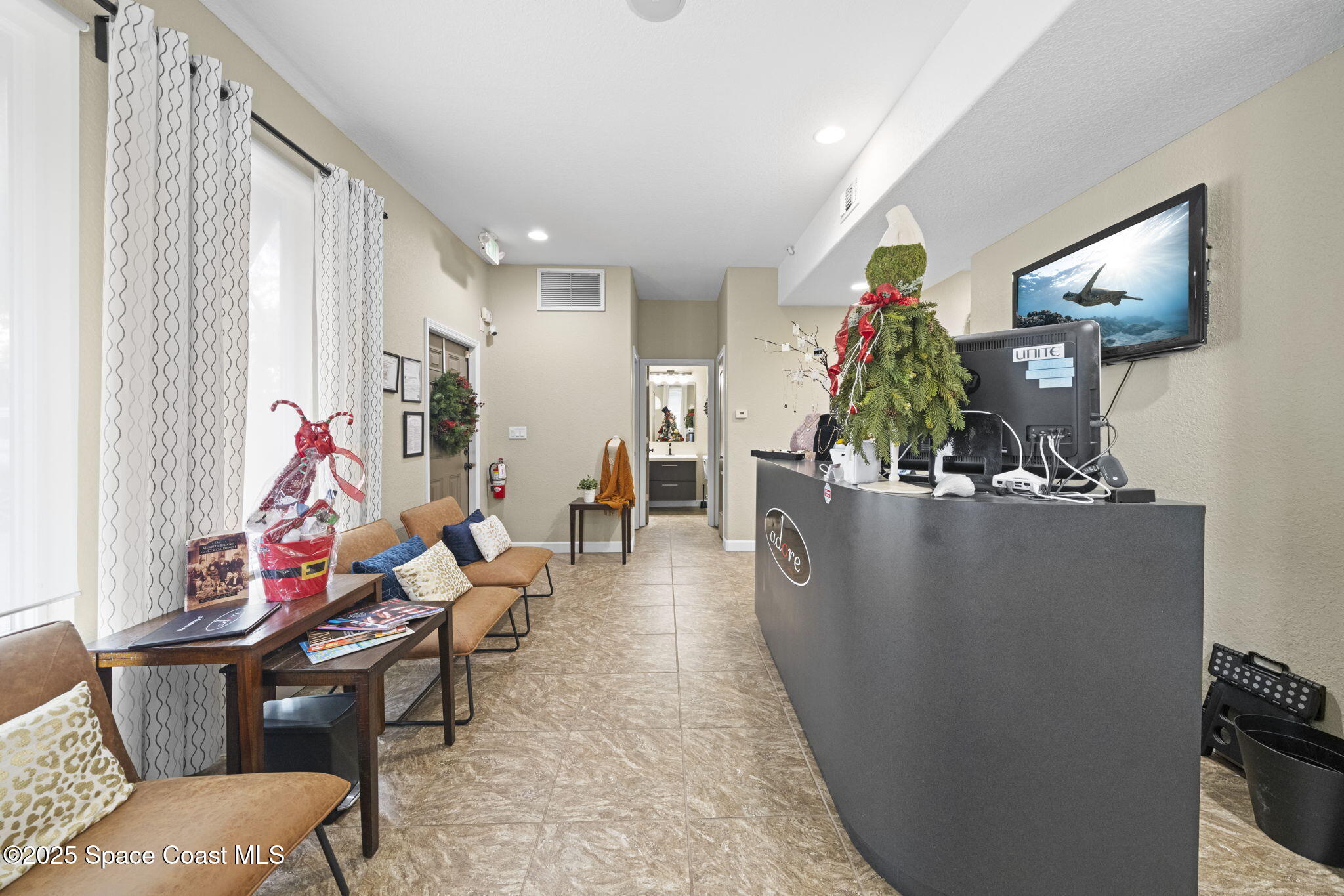 290 Parnell Street Merritt Island, FL 32953 - Photo 15 of 48 a living room with furniture and wooden floor