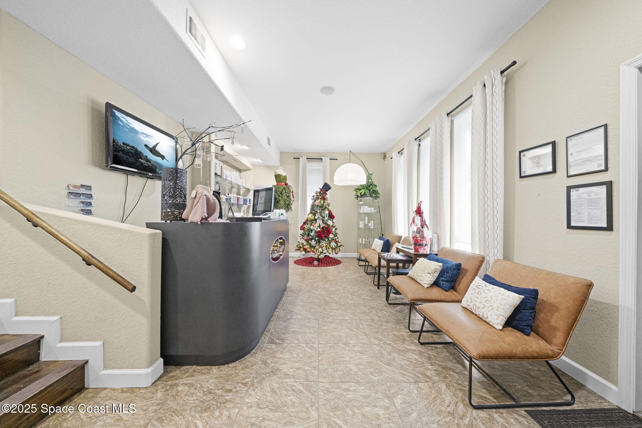 290 Parnell Street Merritt Island, FL 32953 - Photo 17 of 48 a living room with furniture and a potted plant